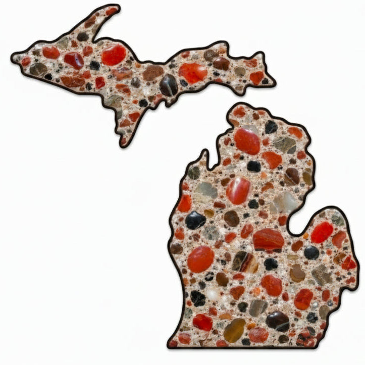 Two die-cut shapes shaped like the Great Lakes states of Michigan, filled with a polished red, orange, brown, and black stone pattern, shown on a white background with rounded corners.